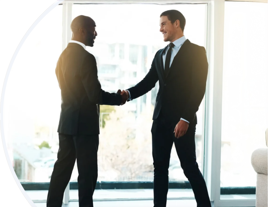 Two business professionals shaking hands